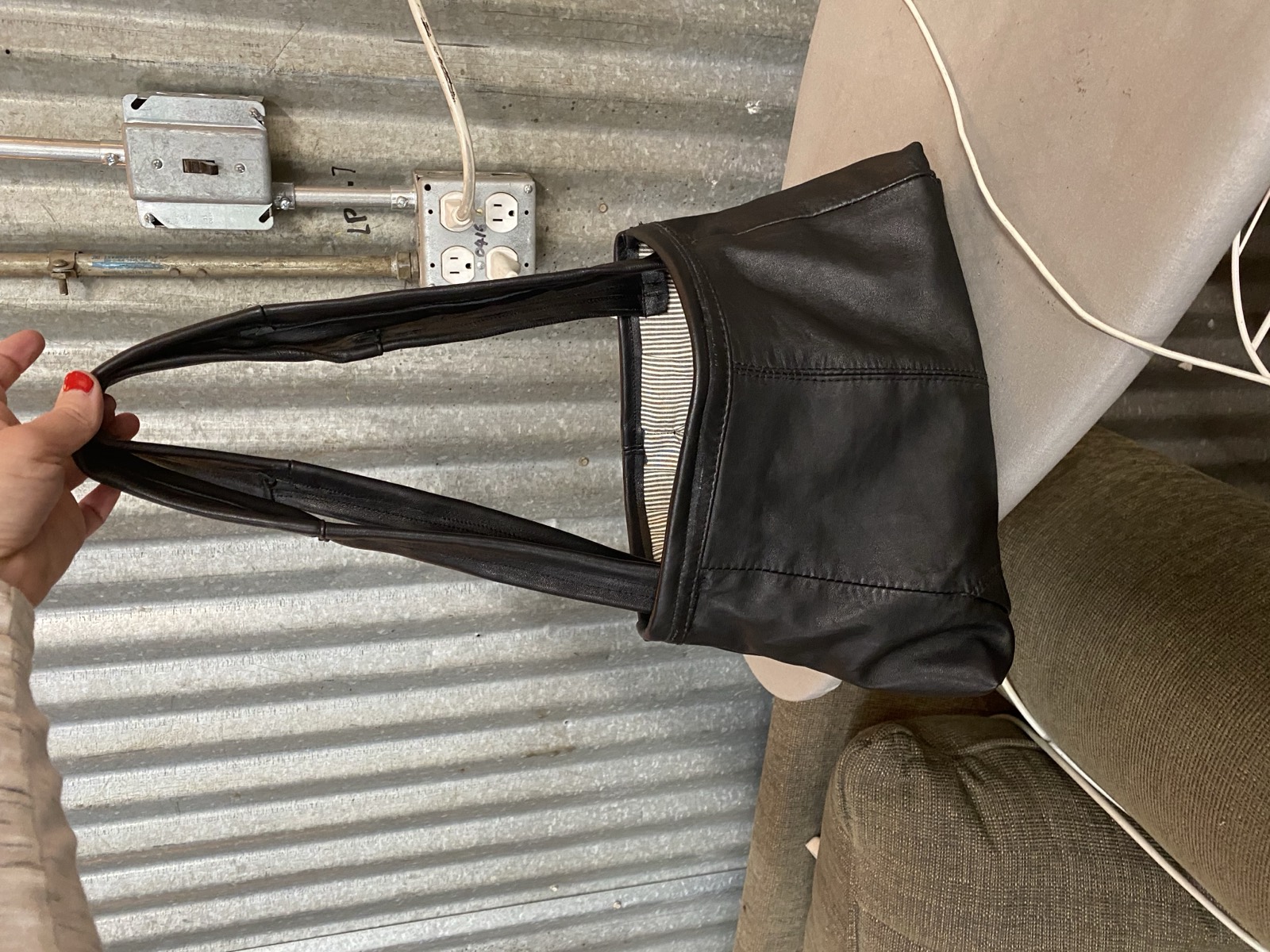 Leather jacket upcycled to purse